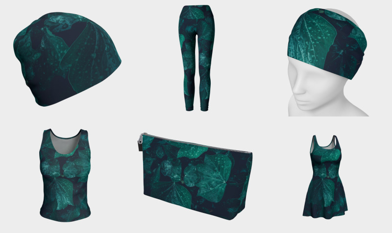 Dark emerald green ivy leaves water drops preview