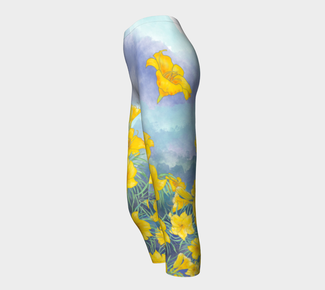 Yellow day lily flowers over cloudy sky capris preview #3