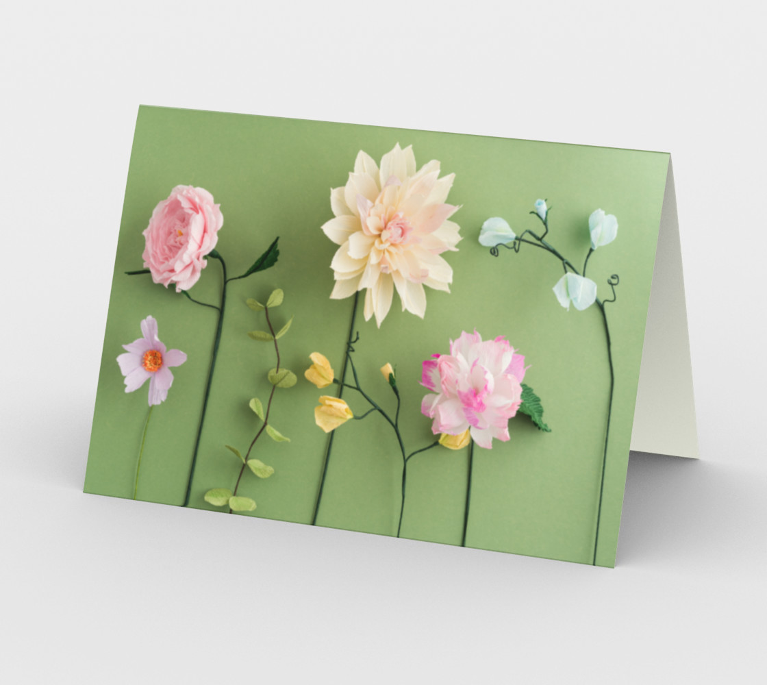 Crepe paper flowers on green preview #2