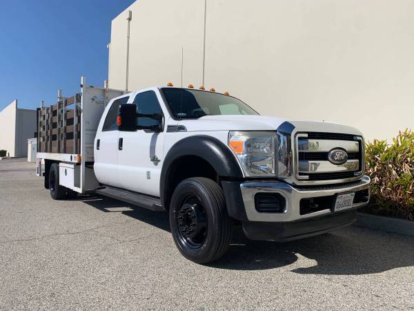 Photo 2011 Ford F550 Crew Cab 1239 Stake Bed Flatbed Lift Gate F-550 F450 6.7 - $39,900 (CA CARB COMPLIANT - Long Beach)