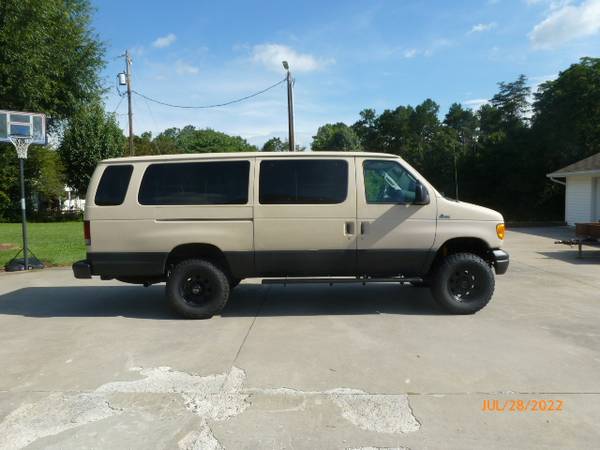Photo nice Ford Quigley 4x4 van - $39,900 (North Wilkesboro)