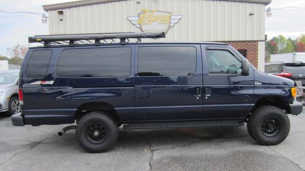 Photo 2003 Ford E350 Super Duty Extended 5 Passenger Quigley 4WD Van - $64,833 (Vans of Great BridgeChesapeake VA)