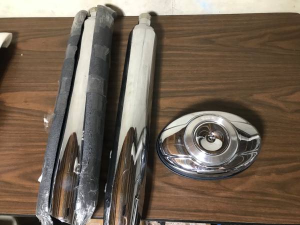 Photo Harley Davidson exhaust, air cleaner cover and windshield lot. $50