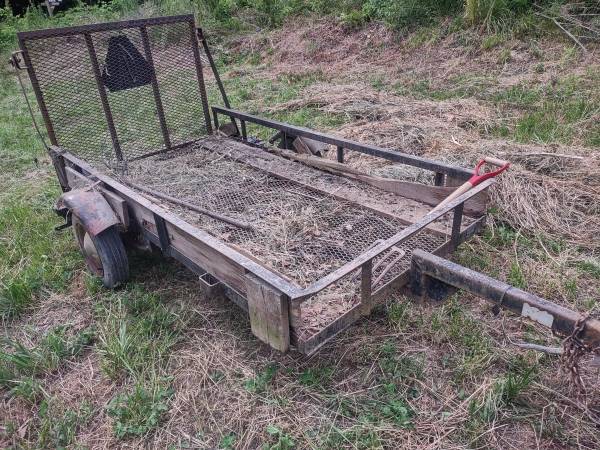 Small flat bed trailer 49 wide 8 long Mesh deck is in good shape