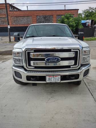 2015 Ford F350 Super Duty Crew Cab with 8 foot bed $27,000