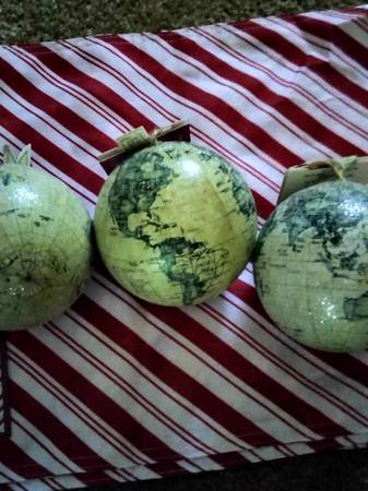four pictures of large Christmas bulbs. the world $3