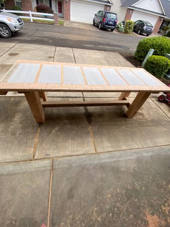Photo New 8 foot tile and wood table $100