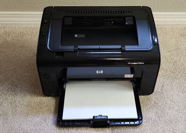 Photo Printer HP LaserJet P1102w. Wireless, Network, USB (100 toner rem.) $75