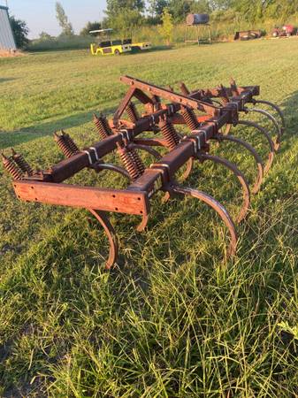 Photo 13 shank 3 point chisel plow $950