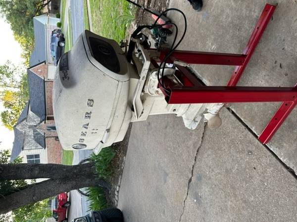 Photo 1967 Sear and Roebuck outboard motor with stand $225