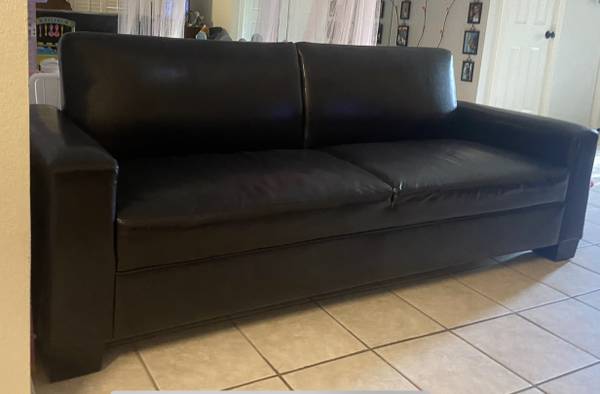 Photo 4-seater Faux Black Leather SofaFuton - $150OBO ( Or Better Offer ) $150