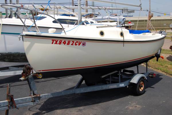Photo Com-Pac 16 sailboat and trailer $6,500
