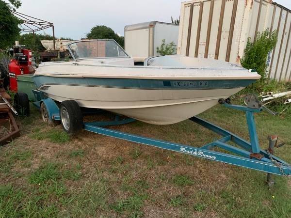 Old boat and trailer $300