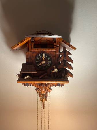 Photo Cuckoo Clock Man Chopping Wood $200
