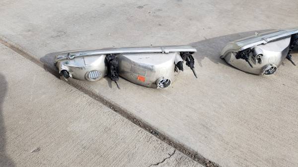 Photo 1997 Mercury Couger OEM headlights $40