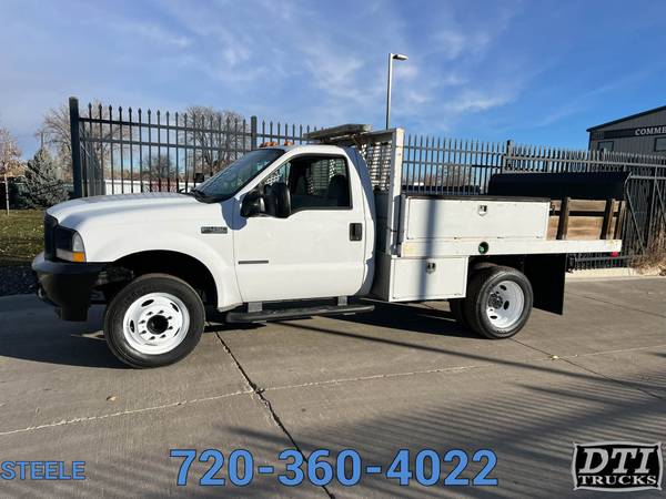 Photo 2002 Ford F-450 10ft utility bed W Lift Gate and removable Stake Side - $21,750 (Commerce City)