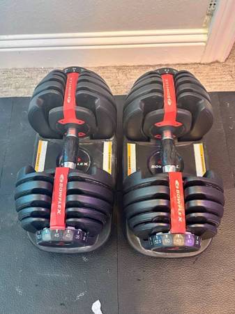 Photo Bowflex 552 dumbbells and stand $450