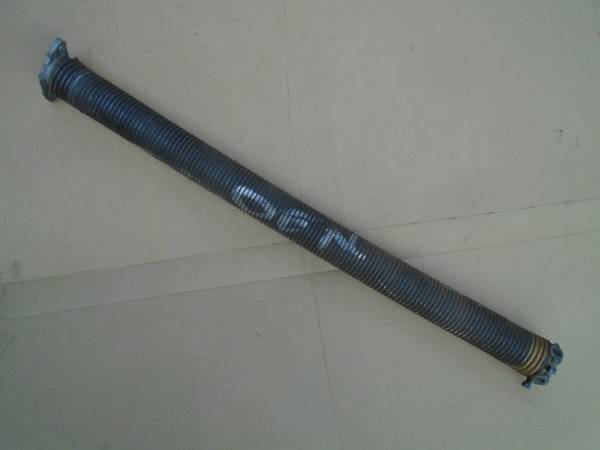 Photo Garage door torsion spring, 33 x 2 x 0.25, right side, used $20