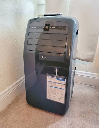 Photo LG Portable Window Air Conditioner (hardly used)AC $280