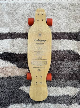 Photo Loaded Ceviche bamboo longboard with Paris trucks, ceramic bearings, and gummy O $200