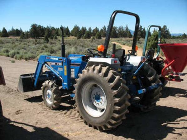 Photo New Holland Ford 1715 Tractor