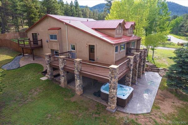 Photo The total package Home in Woodland Park. 5 Beds, 4 Baths $899,000