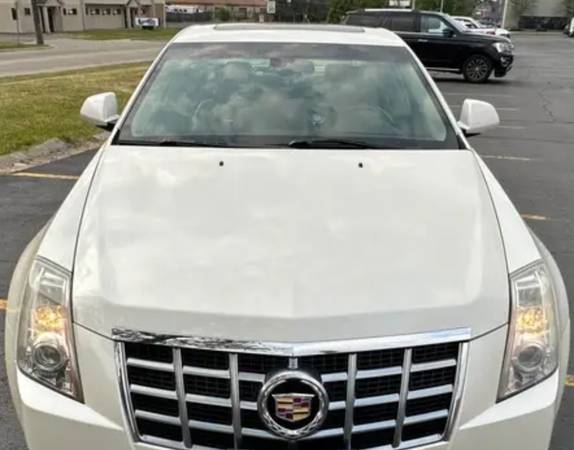 Photo 2013 CADILLAC CTS 4 AWD PREMIUM COLLECTION ( PEARL WHITE PAINT) $7,850
