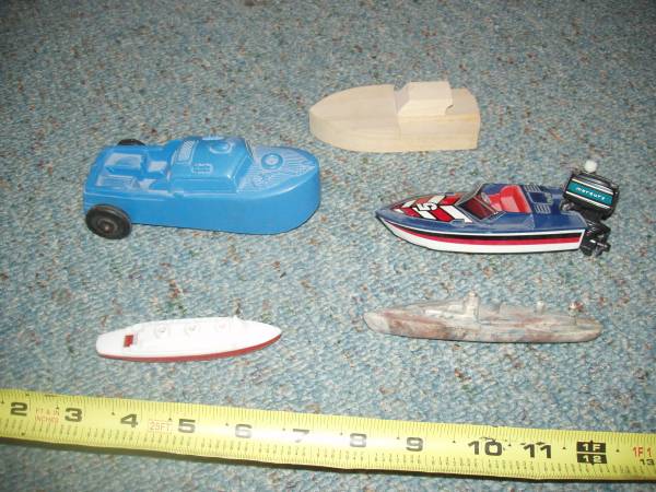 5 TOY BOAT s the biggest one is 6 long- $3