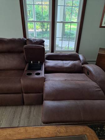 Electric powered couch with middle cup and storage console $350
