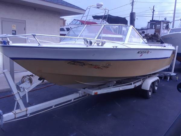 Photo Heres your boat and trailer 21 ft. StarCraft $2,500