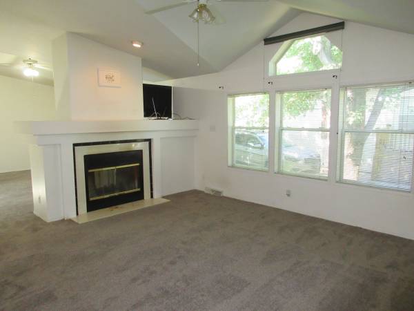 Spacious Home with Full Carport, Large Deck, 2 Living Rooms $52,995