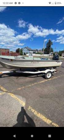 Photo 14 ft smoker craft boat and Spartan trailer no motor $750
