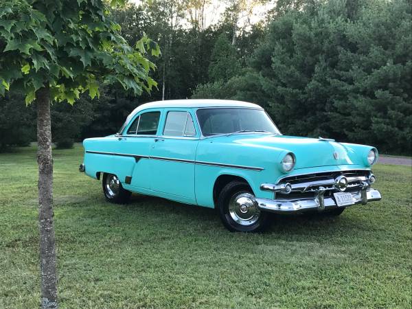 Photo 1954 Ford sedan $5,500