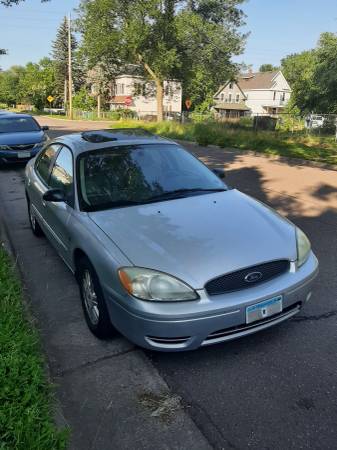 Photo Used Silver Ford Taurus - $1,000 (Duluth)