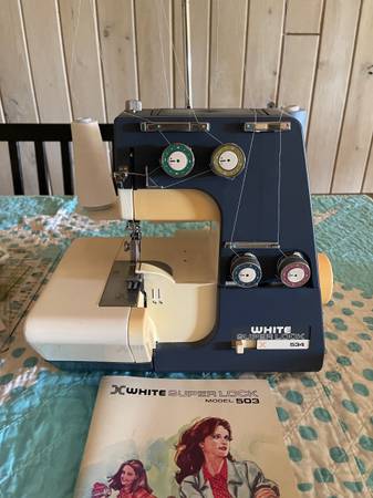 Photo White Superlock Sewing Machine , sewing machine $40