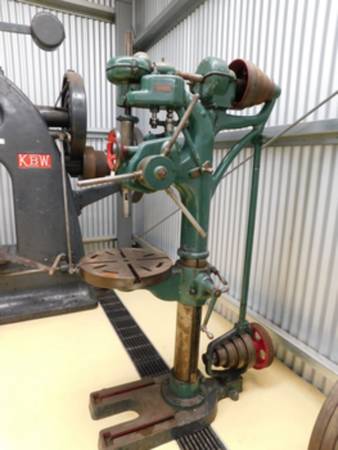 Photo large industrial floor mounted drill press $100