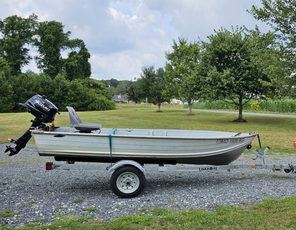 Photo 12 jon boat with trailer and nice motor $2,400