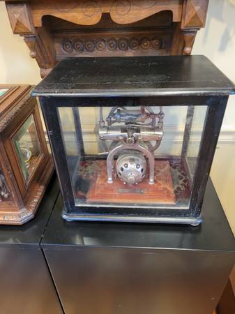 Photo Embalming medical vacuum pump machine with antique glass display case. $375