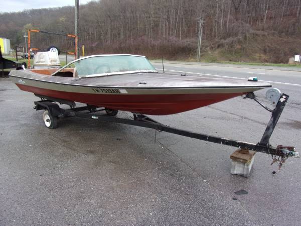 Photo Boat, Motor and Trailer $1,500