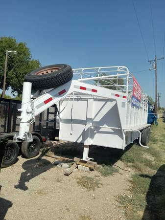 Photo 20 ft stock trailer $7,500