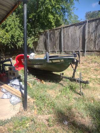 Photo Boat, motor,and trailer $850