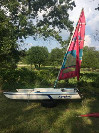 Photo Vintage Catamaran with Hawaain Tropic Sail $1,200