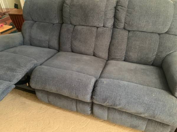 Photo Blue dual reclining couch and loveseat $450