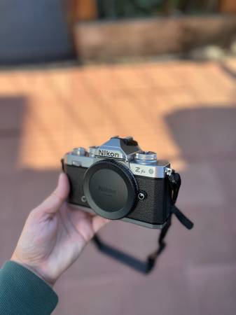 Photo Nikon Z fc Camera  lens, memory card, strap and case $800