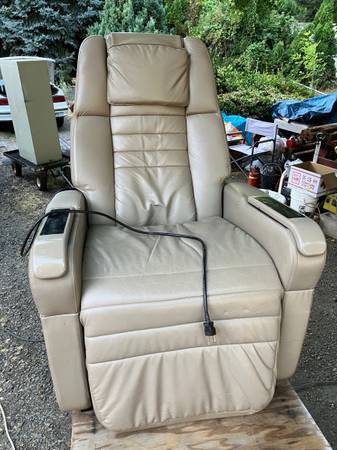 The Get-A-Way Leather Massage Recliner w remote  cassette player- $100 or best