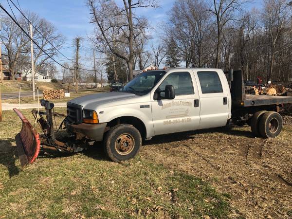 Photo 2000 Ford F-350 V-10 4x4 Dually Flatbed with Snow Plow - $2,500 (Evansville)