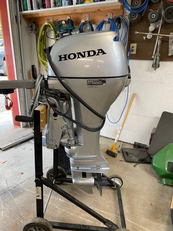 Photo 15hp Honda outboard $3,500