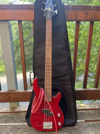 4-string electric bass guitar $75