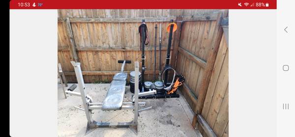 Photo Squat rack. Bench. Weights. Agility ladder and cones. $140