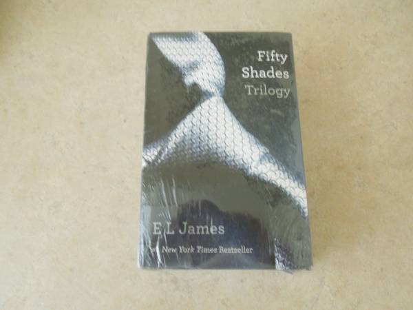 Photo Fifty Shades Trilogy by E L James $25